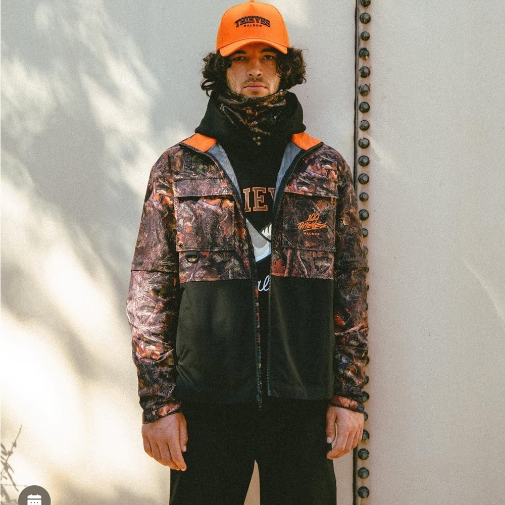 100 Thieves X Malbon Woodsman Zip Off Windbreaker - Tree Camo
